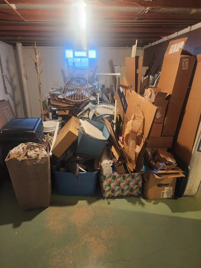 Roll-off dumpster container at job site for Construction Dumpster Rental in Applewood